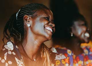 joyous Kenyan woman