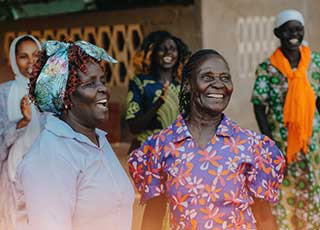 group of Kenyan women laughing about something